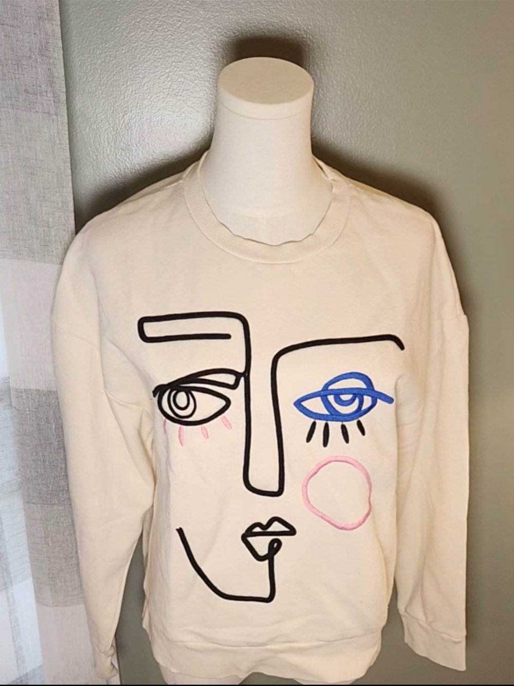 Zara Cream Sweatshirt with Blue and Pink Abstract Face